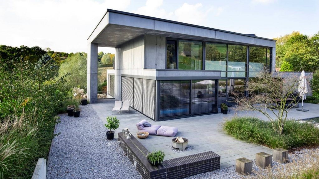 Частный дом с плоской крышей: строить или не строить?